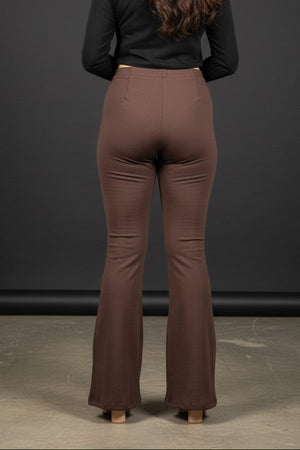 Woman wearing Pavline premium high waist brown flared pants with sleeveless black top for office and casual fashion.