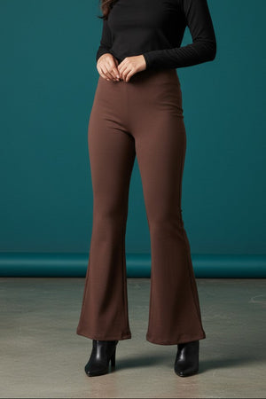 Woman wearing Pavline premium high waist Brown flared pants with sleeveless black top for office and casual fashion.