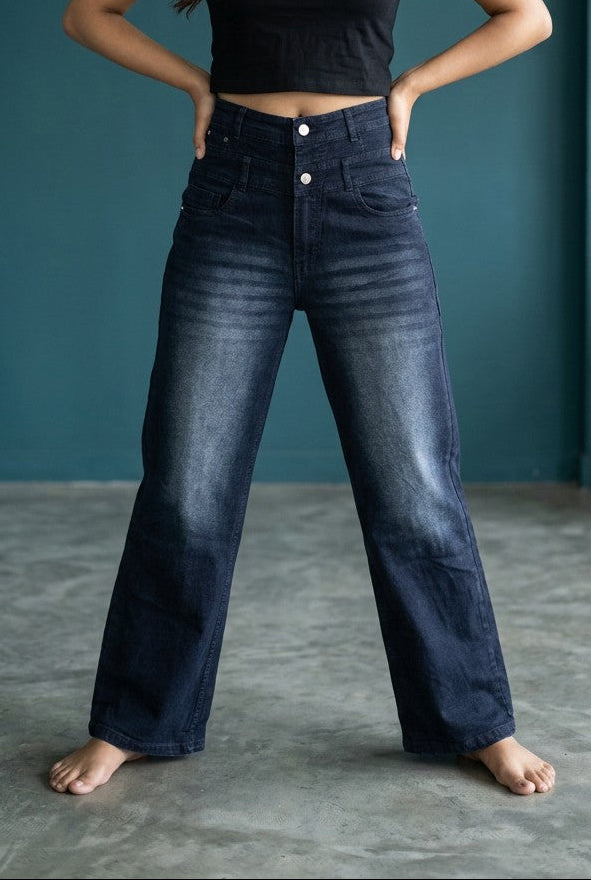 Woman wearing Pavline dark indigo high waist wide leg denim jeans with a black crop top for a modern Korean-inspired casual look.